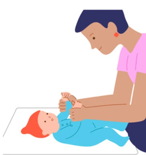 A caregiver talks with a baby during supervised floor play.