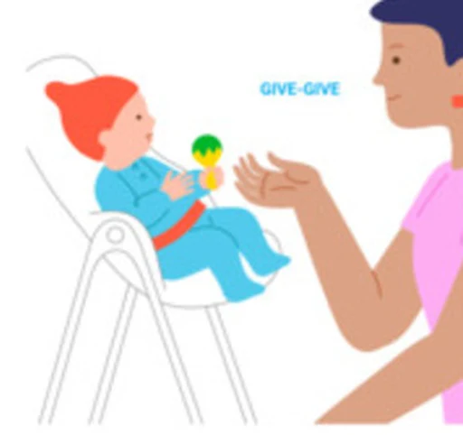A caregiver offers a bright toy to a seated baby.