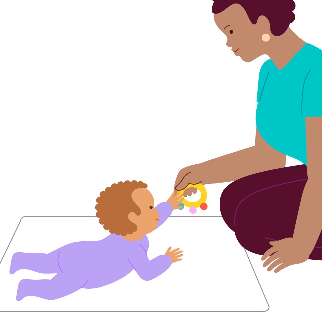 Reach the rattle—crawling around in a circle on tummy, step 3